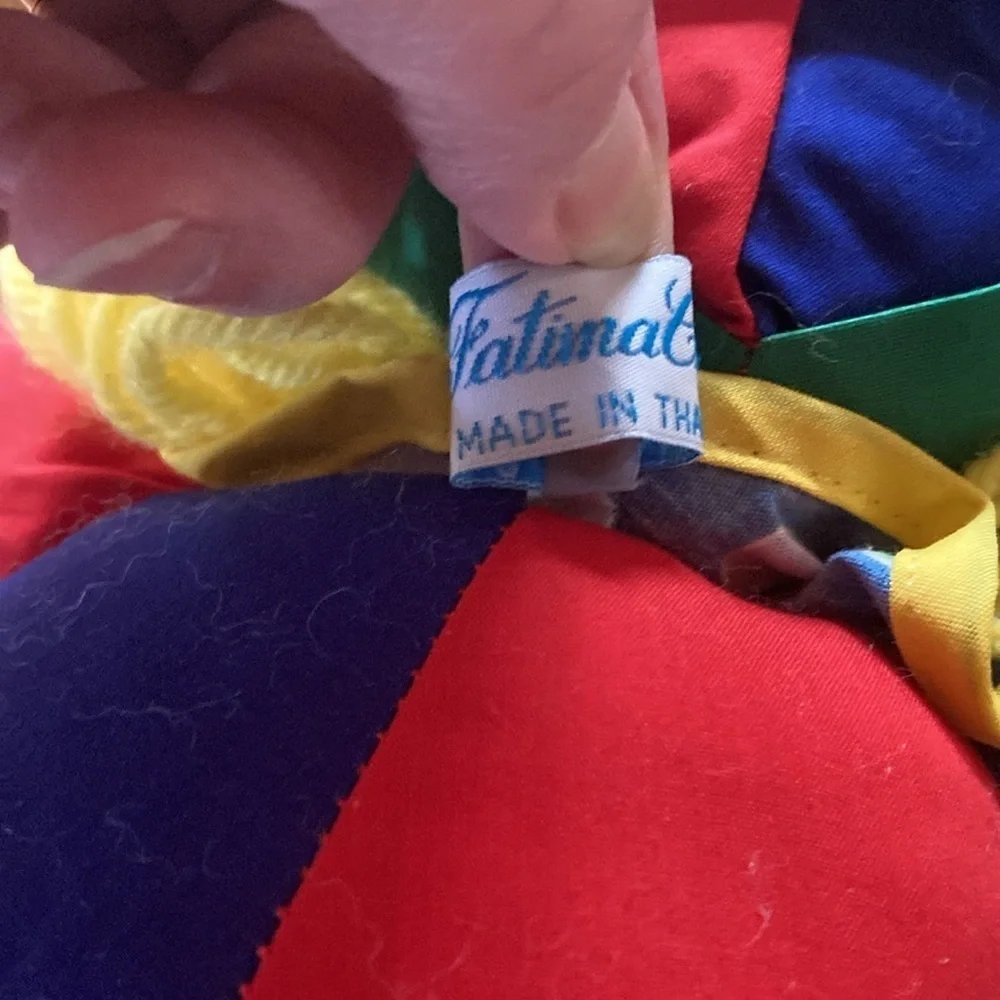 90’s learn and play clown plush primary colors